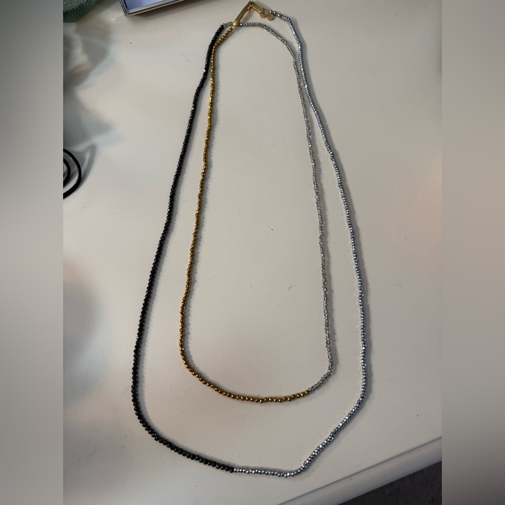 Triple Strand Gold, Silver, and Black Necklace